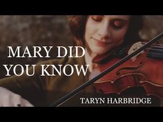 a woman holding a violin with the words mary did you know?