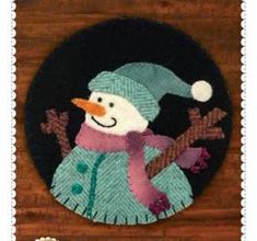 a snowman with a hat and scarf