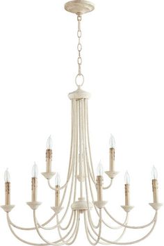 a white chandelier with six lights hanging from it's center and five arms