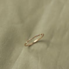 A classic gold ring, ideal for stacking. This piece is dainty and simple—looks great layered with other rings. Classic Gold Rings, Types Of Diamonds, Moissanite Earrings, Moissanite Jewelry, Moissanite Wedding Bands, Classic Gold, Rings Simple, Designer Engagement Rings, Diamond Sizes