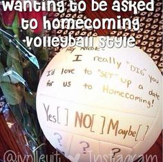 there is a volleyball with writing on it next to flowers and a sign that says, i want you to be asked to home coming volleyball style