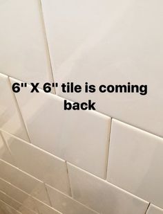 a white tile wall with the words 6x6 tile is coming back on it