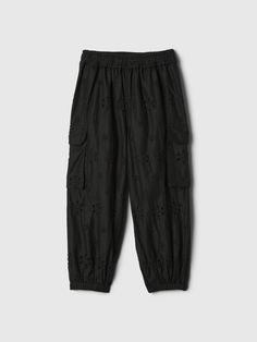 Soft cotton joggers.  Elasticized waist.  Fornt slant pockets.  Side cargo pockets.  Elasticized hem.  Allover eyelet detail.  Easy pull-on waist.  Easy through the hip and thigh.  Tapered leg.  Sizes range from baby to toddler. Gap Relaxed Fit Bottoms With Cargo Pockets, Gap Relaxed Fit Cargo Bottoms, Casual Gap Joggers With Pockets, Gap Bottoms With Pockets Long Pants, Gap Bottoms With Side Pockets For Spring, Gap Casual Ankle-length Pants, Gap Black Casual Pants, Casual Black Gap Pants, Gap Spring Cargo Pants With Pockets