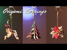 three origami christmas ornaments hanging from hooks and strings with the words organic earrings on them