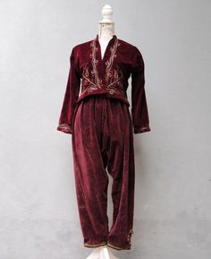 This is a gorgeous example of a beautiful embroidered gold gilt wedding shalwar and jacket set. early 20th Century from the Turkish Ottoman  Empire.Beautiful deep red velvet embroidered with gold gilt.The precision workmanship of the hand embroidered gold gilt metallic thread is exquisite traditional Ottoman Empire craftsmanship.This unique and rare garment is in great state considering its age. There are some stains that did not go away with dry cleaning, but it is clean and has no smell, tears Embroidered Ottoman, Deep Red Velvet, Traditional Ottoman, Turkish Clothing, Turkish Ottoman, Badass Outfit, Greek Style, Ottoman Empire, Women's Costumes