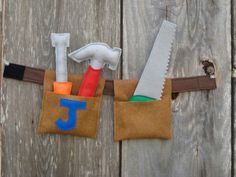 a pair of scissors in a pocket with the letter j on it