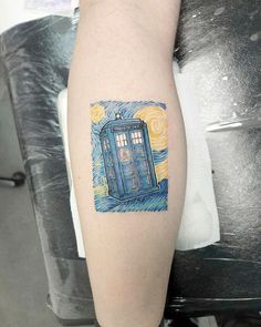 a blue tardish tattoo on the right arm and left leg, with an image of a doctor who appears to be floating in space