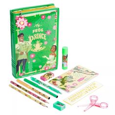 the frog prince gift set includes stationery, pencils, and markers in a green case