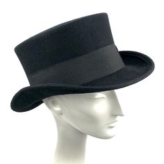 Edwardian top hat. You can make your hat with your favorite color by choosing it from my Wool felt color card. Made with short crown and embellished with a 50 millimeters wide grosgrain ribbon. Edwardian top hat ideal for everyday and special ocasions such as weddings, cocktails or parties. For man and woman. Measurements in centimeters are 32 x 27. Crown height 11. Brim length 6. These measurements may have some slight variation depending on the size of the hat. The end of the brim is reinforce Classic Winter Costume Hats And Headpieces, Classic Wide Brim Winter Costume Hats And Headpieces, Classic Fitted Cloche Hat With Short Brim, Classic Adjustable Costume Hats And Headpieces For Winter, Classic Wide Brim Winter Costume Hat, Classic Winter Cloche Hat, Vintage Solid Color Felt Hat With Flat Brim, Vintage Solid Flat Brim Felt Hat, Classic Fitted Cloche Hat With Flat Brim