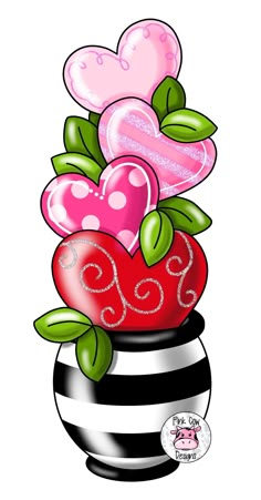 a vase filled with lots of hearts on top of a white and black striped table