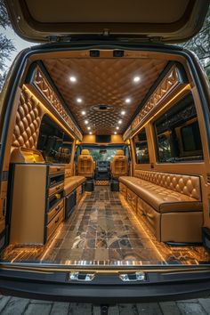 the interior of a luxury vehicle with its doors open and leather seats in place for people to sit inside