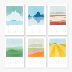 four calendars with mountains and watercolor paints on them, each one has a different color