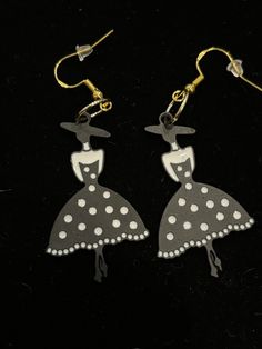 "Dripping oil alloy earrings with hypoallergenic ear wires.  A lovely woman in a black and white polka dot dress and stylish hat earrings.  An Ellie's Original Design. This is part of the \"Rodeo Drive\" Collection - enjoy yourself!" Black Retro Earrings, Black Party Earrings For Summer, Elegant Black Earrings For Spring, Cute Black Party Earrings, Chic Black Earrings For Summer, Dress Earrings, Woman In Black, Snowflake Earrings, Rodeo Drive