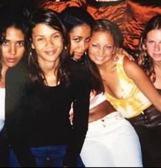 a group of young women posing for a photo