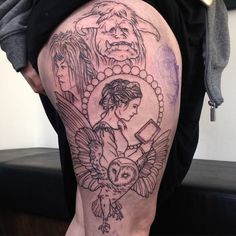 a woman with tattoos on her thigh