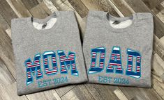 Mom and dad crewneck sweatshirts made from new baby blankets just like the ones used in hospitals. Date can be customized or deleted. Listing includes a unisex 50/50 blend Gildan brand sport grey crewneck sweatshirt. Please contact me to customize sweatshirt colors. Please message me if shirts need to be two different sizes. If either is 2X, please order using that size and message me with the second size. Mom And Dad Sweatshirts, Blanket Sweatshirt, Hospital Blankets, Sweatshirt Colors, Dad Baby, Grey Crewneck, Baby Memories, Sweatshirt Set, Custom Sweatshirts