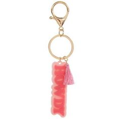 a key chain with a pink plastic object hanging from it