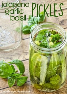 pickled jalapeno, garlic and basil in a jar with text overlay