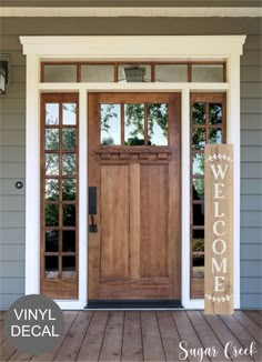 the front door to a house with two sidelights on each side and an open window