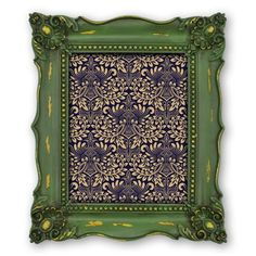 an ornate green frame with blue and gold designs on it's sides, in front of a white background