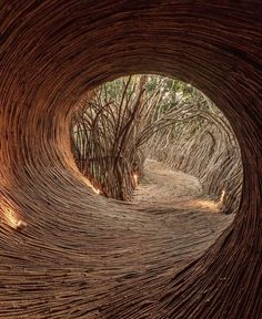 the inside of a wooden structure that looks like it has been made out of sticks