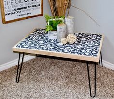 a coffee table with some plants on it