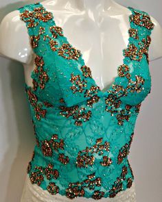 Sequined crop top sleeveless blouse cami in green floral lace with copper bronze beads and sequins Green And Copper, Lace Bustier Top, Crop Top Sleeveless, Gold Color Combination, Turquoise Lace, Dance Apparel, Lace Sleeveless Top, Colorful Crop Tops, Sequin Crop Top