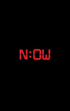 the word now written in red on a black background