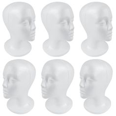 six white mannequin heads with different angles