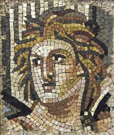 a mosaic depicting the face of jesus