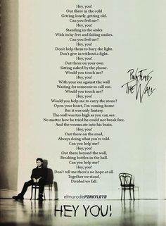 a man sitting in a chair with a poem written on the wall behind him that says, hey you