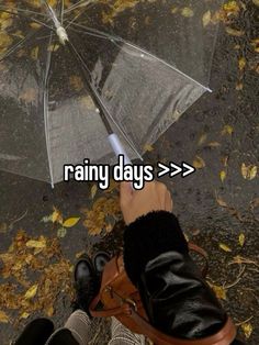 someone holding an umbrella with the words rainy days > > > on it in front of them