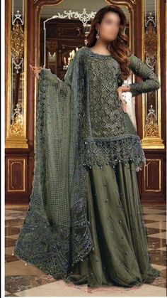 *Brand Name*     *MARIA B * *ORGANZA/NET*       *FABRIC DETAILS *  (SHIRT) ...ORGANZA (DUPATTA)ORGANZA (TROUSER) MALAI & NET *EMBROIDERY DETAILS* *FRONT*  EMBROIDERED *with stones handwork & cutwork* *NECK*  EMBROIDERED *with stones handwork* *FRONT*  BORDER EMBROIDERED *with stones handwork* *BACK* EMBROIDERED BACK BORDER EMBROIDERED *SLEEVES* EMBROIDERED SLEEVES BORDER EMBROIDERED *DUPATTA * EMBROIDERED *with 4 side embroidered border* *GHAGRA*  EMBROIDERED  *BEST QUALITY IS OUR TOP PRIORITY* The model picture is only for reference you will get the dress as shown in unstitch pic. This dress will be make to order according to your size (your given measurements) and will be ready to ship in 4 to 5 weeks. Festive A-line Evening Dress For Wedding, Green A-line Wedding Dress, Festive A-line Wedding Gown, Glamorous Festive Dresses With Dabka Work, Elegant Festive Sharara For Evening, Elegant Evening Sharara For Festive Occasions, Festive A-line Wedding Dress, Elegant Formal Gown With Dabka Work, Traditional A-line Party Dress