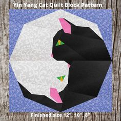 a black cat quilt block pattern on a wooden background with text that reads, yin yang cat quilt block pattern finished size 12'x 10 '