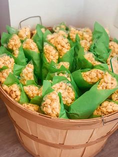 a basket filled with lots of food on top of a wooden floor