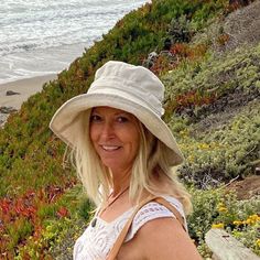 "A handmade sun hat for sunny beach days and summer fun.  This linen sun hat for women has a nice wide brim to protect your whole face and even your neck and chest. A drawstring around the head keeps the hat fitting snug.  Easy to bring along in your bag, folds up easy.   This hat is made from a medium weight homespun linen and cotton blend fabric in a neutral beige color.  Inside liner is white cotton.  I used a stiff interfacing for brim to keep it's shape. Brim measures 4.5\" Crown depth is 3 Beachy Sun Hat, One Size Fits Most, Beachy Sun Hat With Uv Protection, Bohemian Cream Sun Hat For Vacation, Bohemian Beige Panama Hat With Upf 50+, Bohemian Brimmed Cream Sun Hat, Cream Bohemian Wide Brim Sun Hat, Bohemian Cream Wide Brim Sun Hat, Coastal Sun Hat For Beach Travel, Coastal Style Sun Hat For Beach Travel