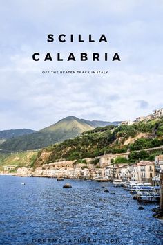 an image of the ocean with mountains in the background and text that reads, sicla calabria off the beaten track in italy