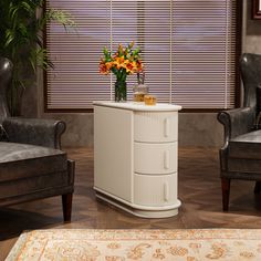 a living room with two chairs and a table that has flowers in it on top