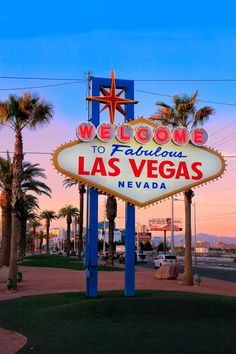 the welcome to fabulous las vegas sign at sunset