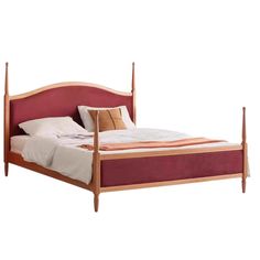 a bed with two wooden posts on the headboard and foot board, made in solid wood