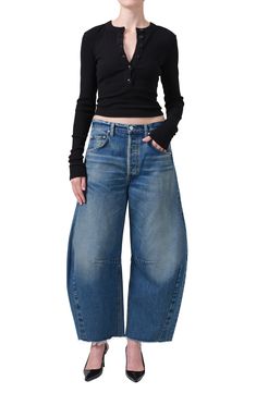 A superhigh waist and structured, curved wide legs cut a chic silhouette in these oversized, raw-cropped jeans crafted from nonstretch denim. 26 1/2" inseam; 20" leg opening; 13 1/4" front rise Button fly Five-pocket style 100% regenerative cotton Machine wash, tumble dry Made in the USA High Rise Barrel Jeans Outfit, Horseshoe Jeans, Barrel Jeans, Maxi Jumpsuit, Perfect White Tee, Jean Crafts, Favorite Daughter, Cozy Outfit, Oversized Silhouette