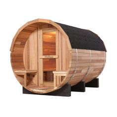 a wooden barrel sauna with the lid open