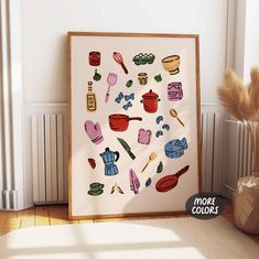 an art piece with kitchen items on it next to a potted plant and radiator