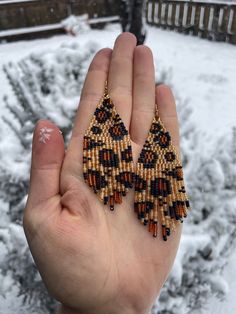 Handmade Cheetah print seed bead earrings. These hooks are not hypo-allergenic. Please let me know if you would like silver stainless steel ones.  These are approximately 3 inches long. These are pre-made and sold as is - pair in photo is the pair being sold.  By supporting my business you are supporting small and woman-owned! Brown Dangle Jewelry With Black Beads, Beaded Fringe Earrings, Jewelry Design Earrings, Design Earrings, Beaded Fringe, Seed Bead Earrings, Fringe Earrings, Bead Earrings, My Business