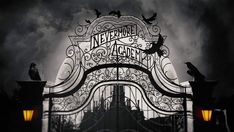 an iron gate with two birds on top and the words nevermore is gone written above it