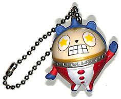 a keychain with a cartoon character on it's face and arms, hanging from a ball chain