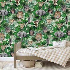 a bedroom with a wallpaper that has jungle animals on it and palm leaves in the background