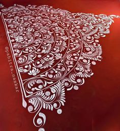 an image of a red table with white designs on it and the words all posts below