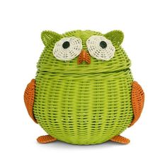 a green basket with an orange and white owl on it