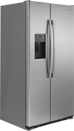 a silver refrigerator freezer sitting next to a white wall with the door ajar